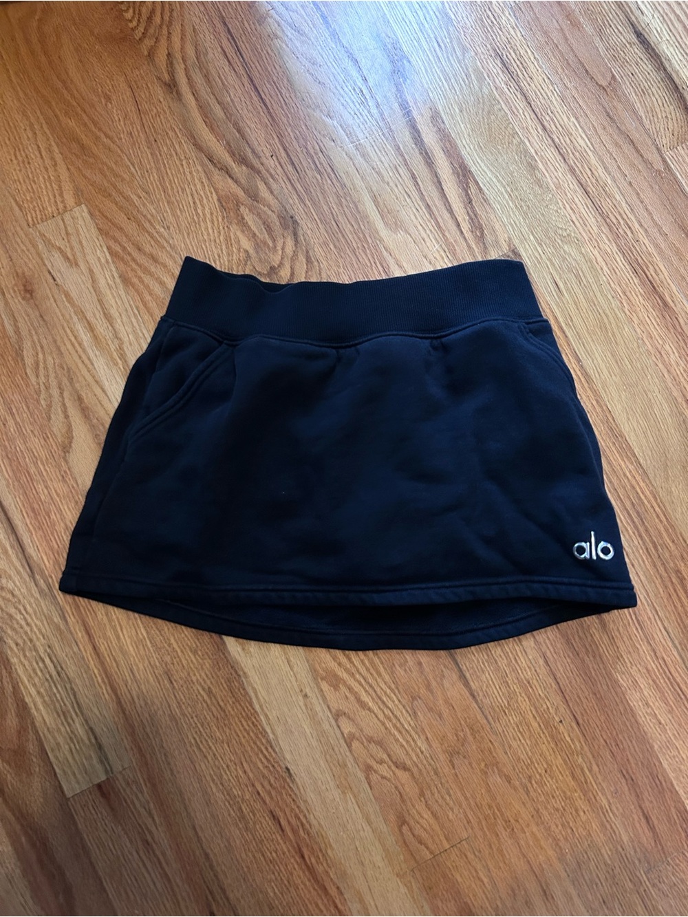 ALO Yoga black mini skort with logo